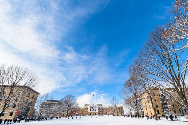Looking up Bascom hill that is snow covered on a bright blue wintery day.