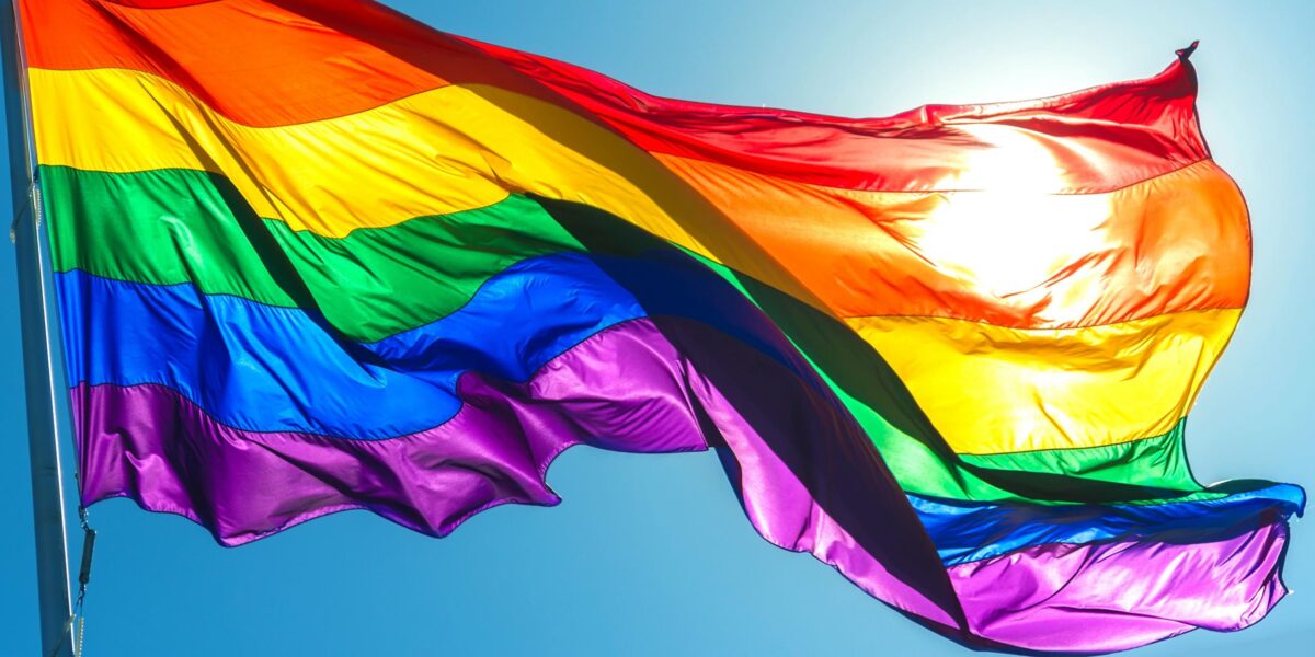 Pride flag waving outdoors