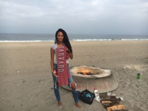 Kamilah Willingham photographed burning Harvard memorabilia as part of the #JustSaySorry campaign.