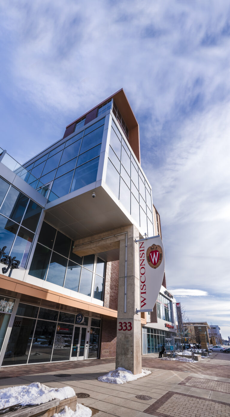 The outside of 333 East Campus Mall on a sunny, cold day.