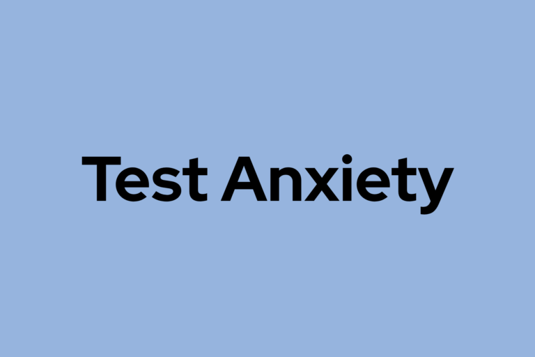 Blue background with black text that says "Test Anxiety"