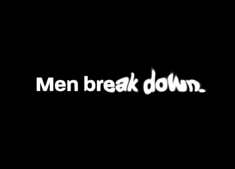 Black background with white text that says men break down.