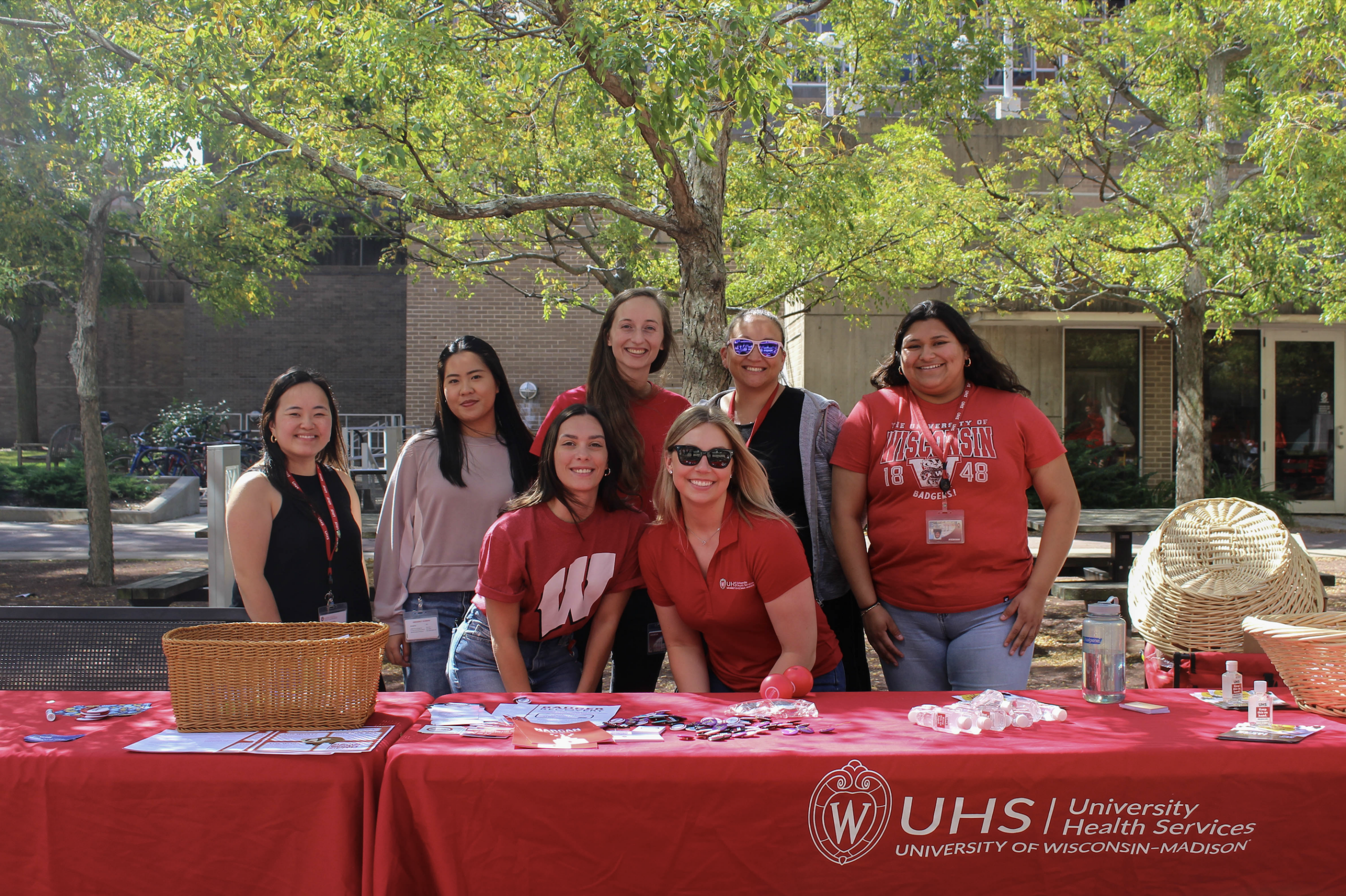 A group of UHS staff at an outdoor resource fair