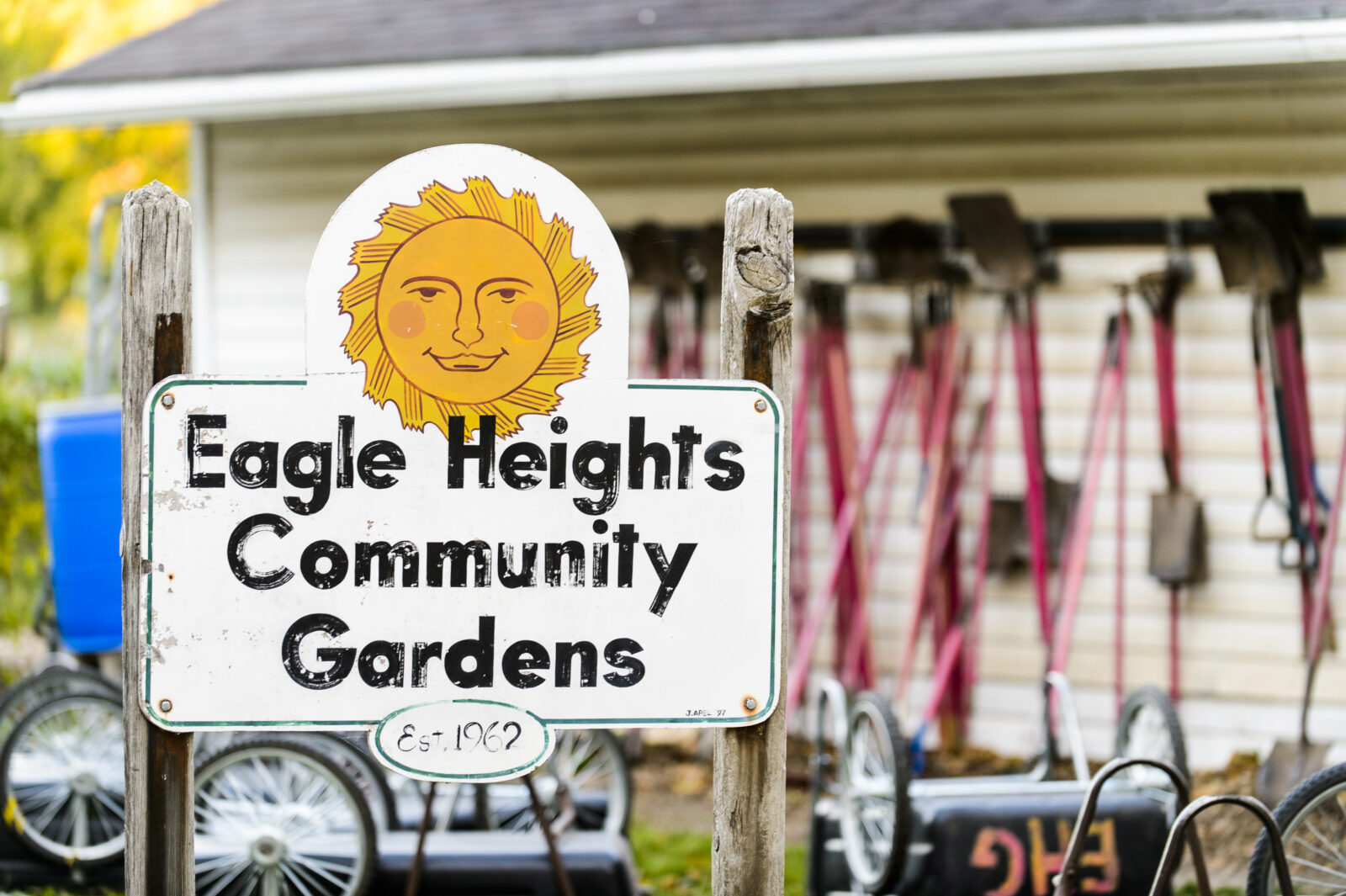 Metal sign that says Eagle Heights Community Gardens.