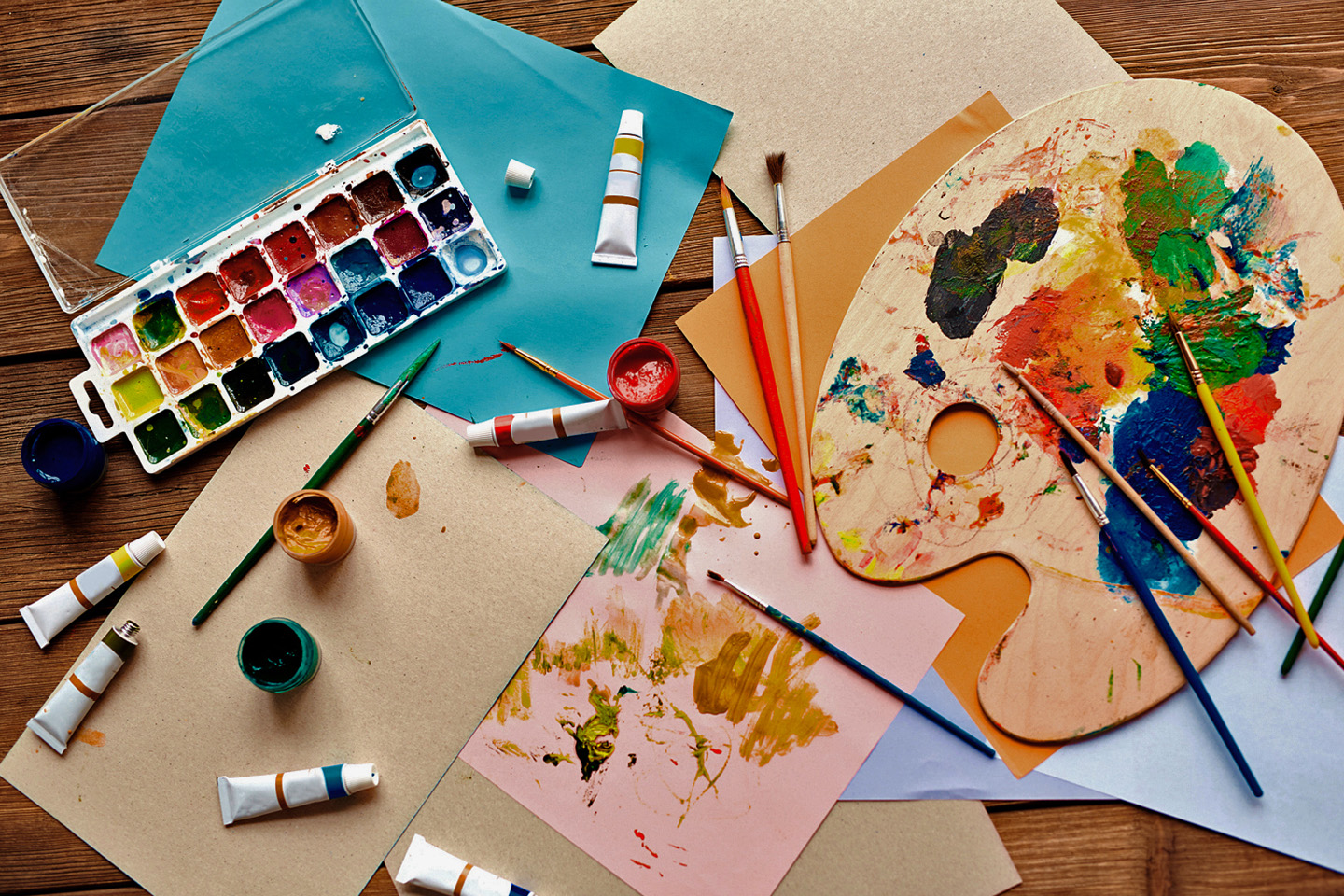 Flat lay of paint and paint brushes